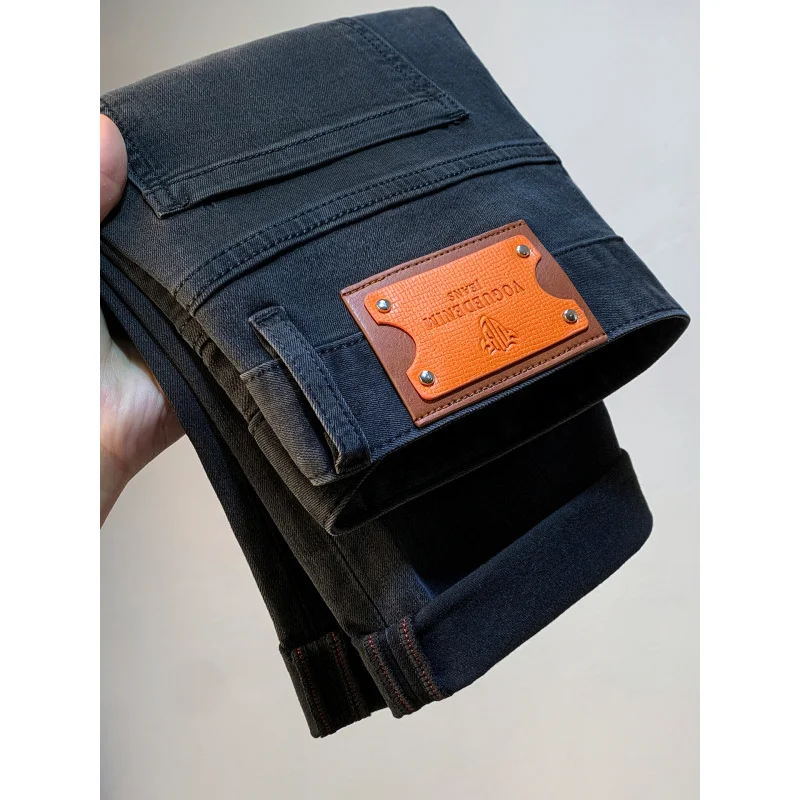 กางเกงยีนส์สีดำทรงตรงเล็ก สไตล์หรูหรา ระดับไฮเอนด์ สำหรับผู้ชาย รุ่นใหม่ล่าสุดประจำฤดูใบไม้ร่วงปี 2025 ทรงเข้ารูป สวมใส่ได้หลากหลาย สไตล์ลำลอง ความยาว 9 ส่วน