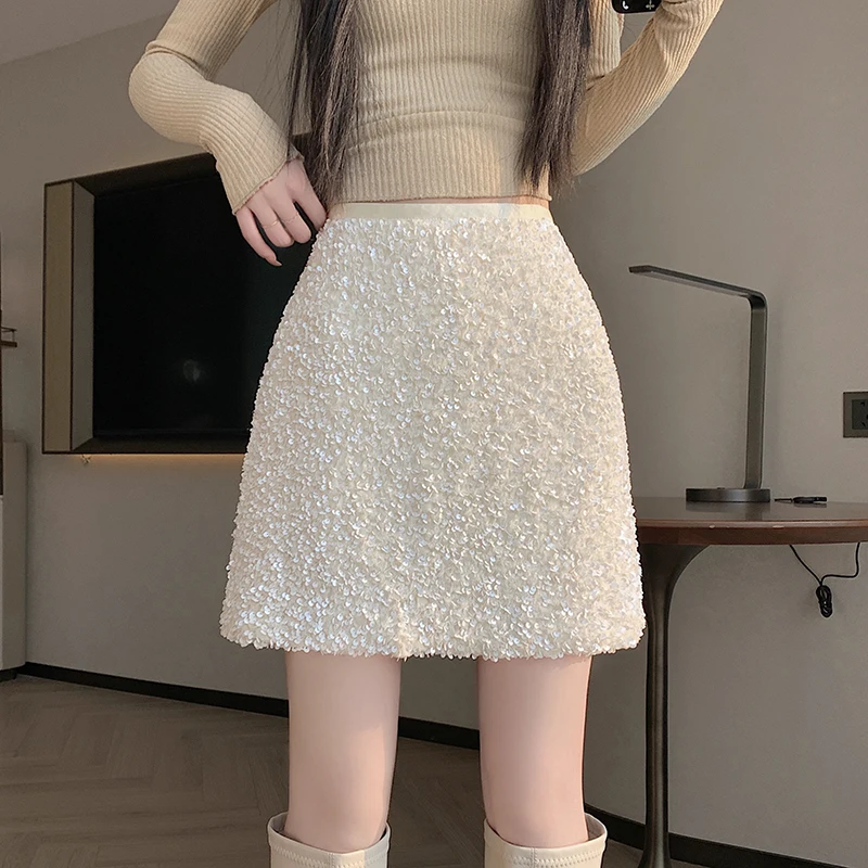 

Новая блестящая мини-юбка 2026 года, весенняя, черная, универсальная, с защитой от просвечивания, А-силуэт, короткая юбка со встроенными шортами