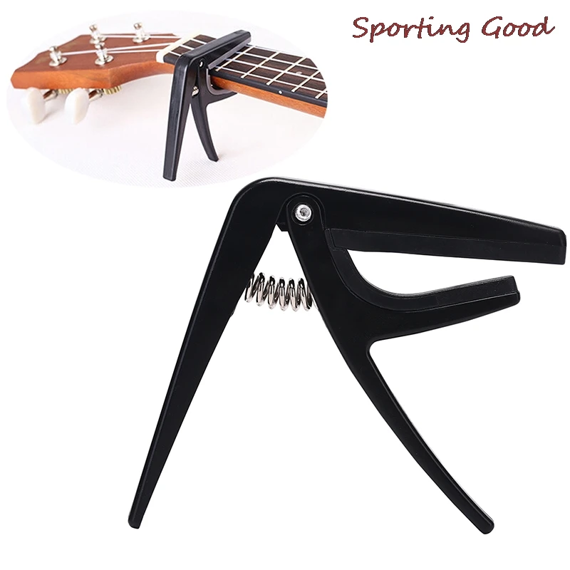 Irin 1pc neue Ukulele Capo Einhand-Schnell wechsel Ukelele Capo Kunststoff Stahl Gitarren teile & Zubehör Großhandel