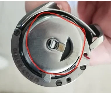 

Durkopp 269 Bobbin Case Circled In Red