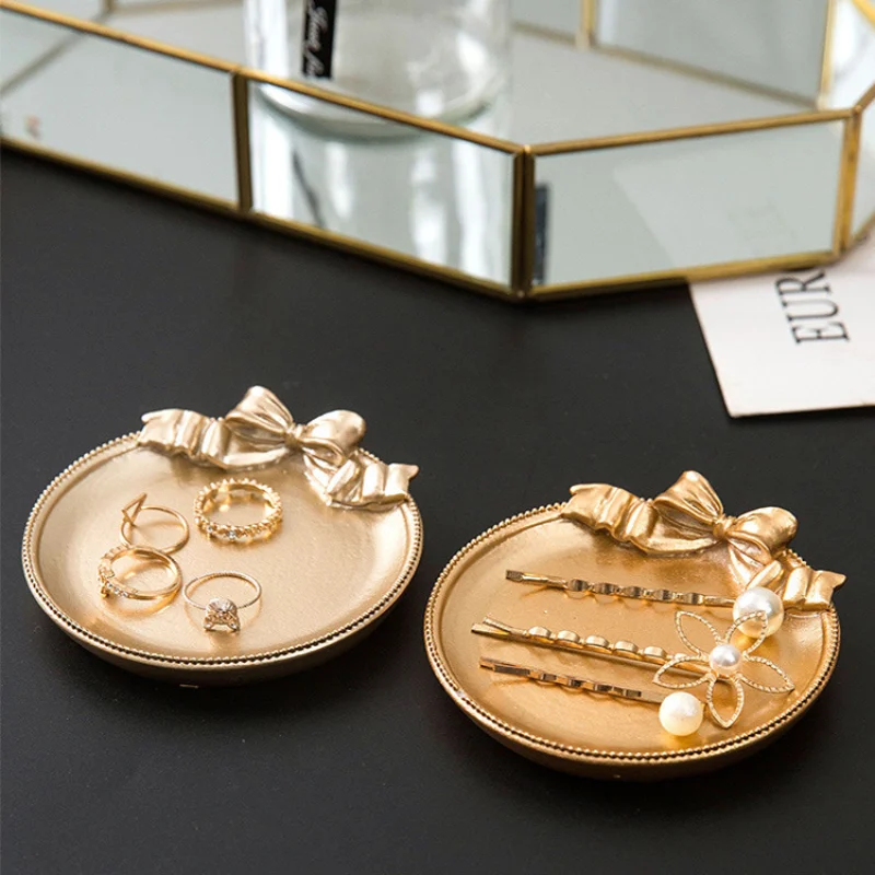 

Nordic-inspired resin bow metallic-finish jewellery dish earring tray ornamental piece earring storage box