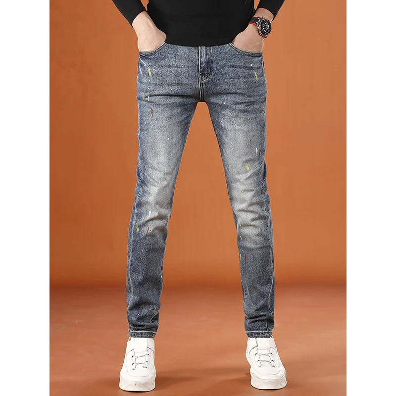 2025 autumn new trend fashionable splashed ink printed men's jeans autumn and winter elastic small leg pants