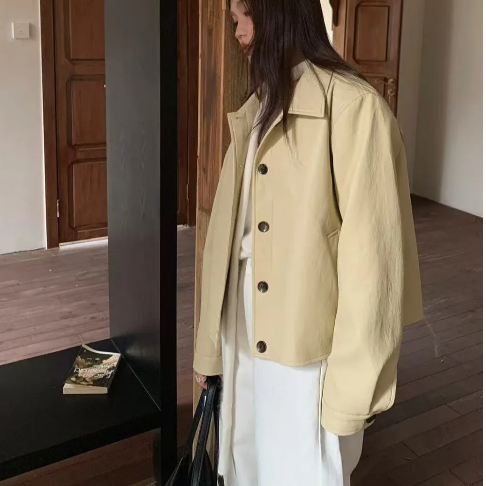 เสื้อแจ็คเก็ตหนังผู้หญิง สไตล์ชิค ลำลอง คอปกหลวม วินเทจ อเนกประสงค์ สำหรับฤดูใบไม้ร่วงและฤดูหนาว ดีไซน์เรียบง่าย เหมาะสำหรับใส่ไปทำงาน แขนยาว