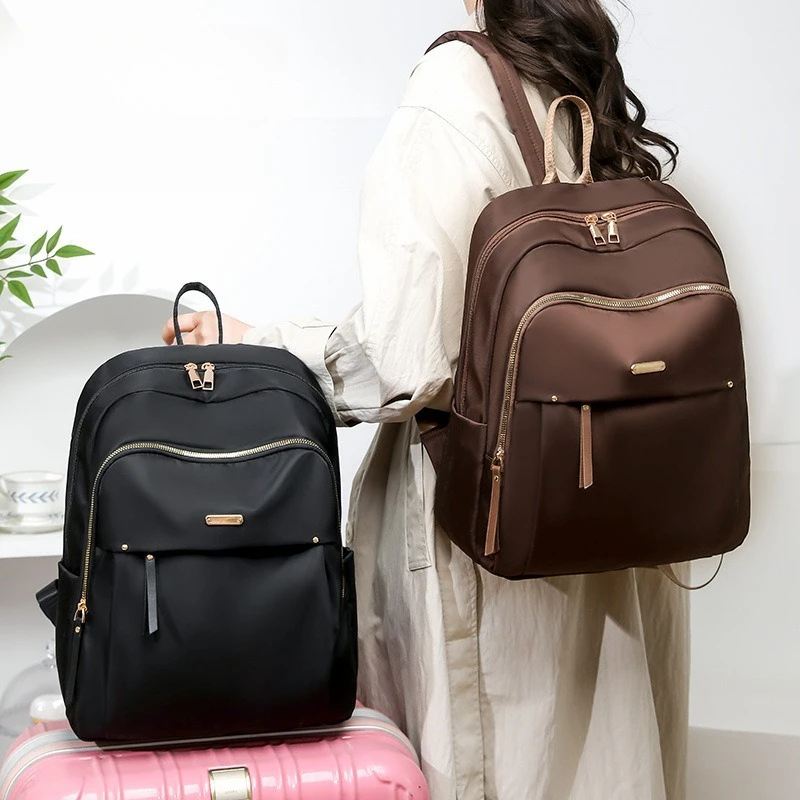 Europe and the United States nylon backpack Joker waterproof multifunctional backpack large capacity simple commuter bag.