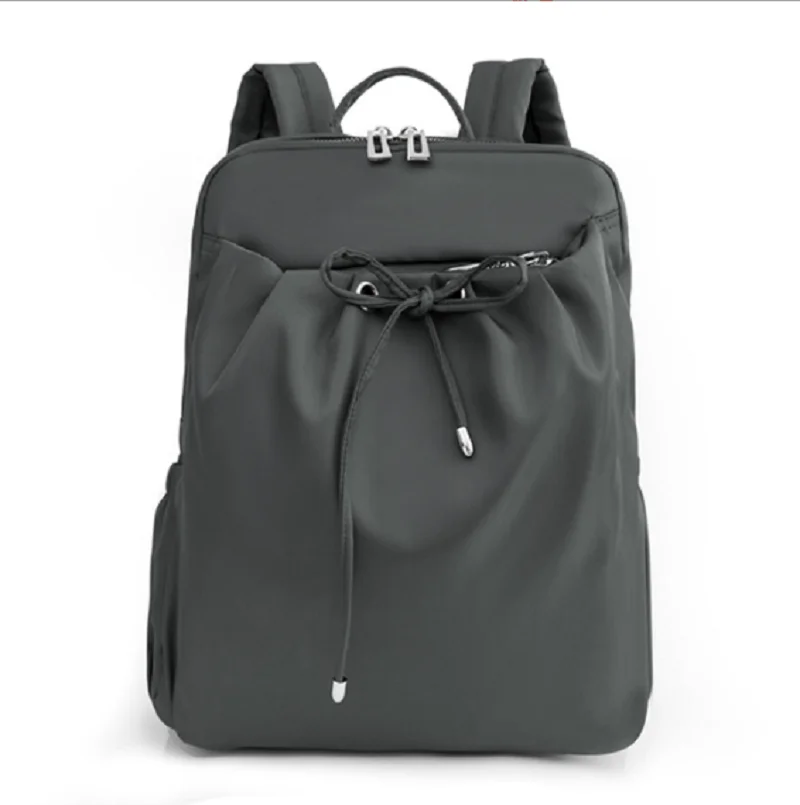 Mochila impermeable de nailon para hombre y mujer, morral escolar de gran capacidad para ordenador portátil, bolso de hombro informal, tendencia de moda, novedad