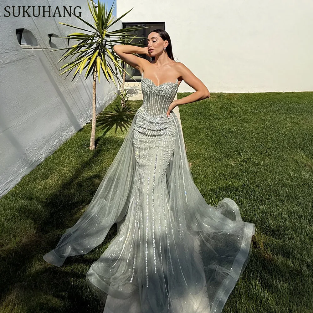 فساتين سهرة طويلة بحورية البحر باللون الأخضر من SUKUHANG Dubai على شكل قلب مع تنورة للحفلات الراقصة مطرزة حسب الطلب