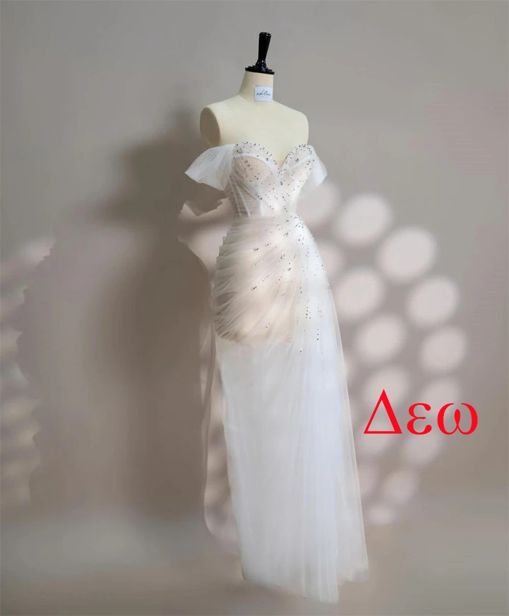 カスタマイズされた高級ホワイトオーガンザスパンコールのウェディングドレス絶妙なストラップレスオフショルダー半袖背中の開いたブライダルドレス