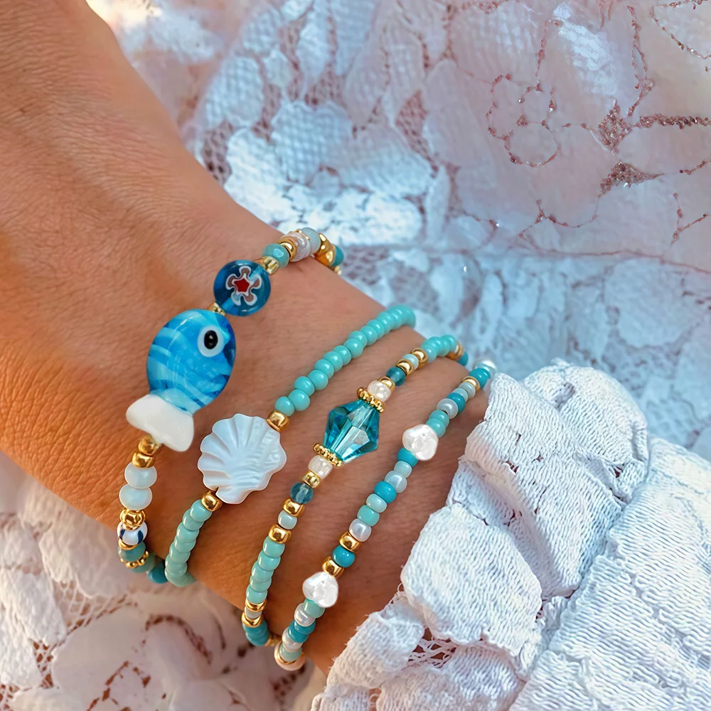 Beaded bracelet Blue Fish Sea shell Pearl Bohemia Crystal Graph Originality Hand knitting Elastic force Tide Rice bead bracelet