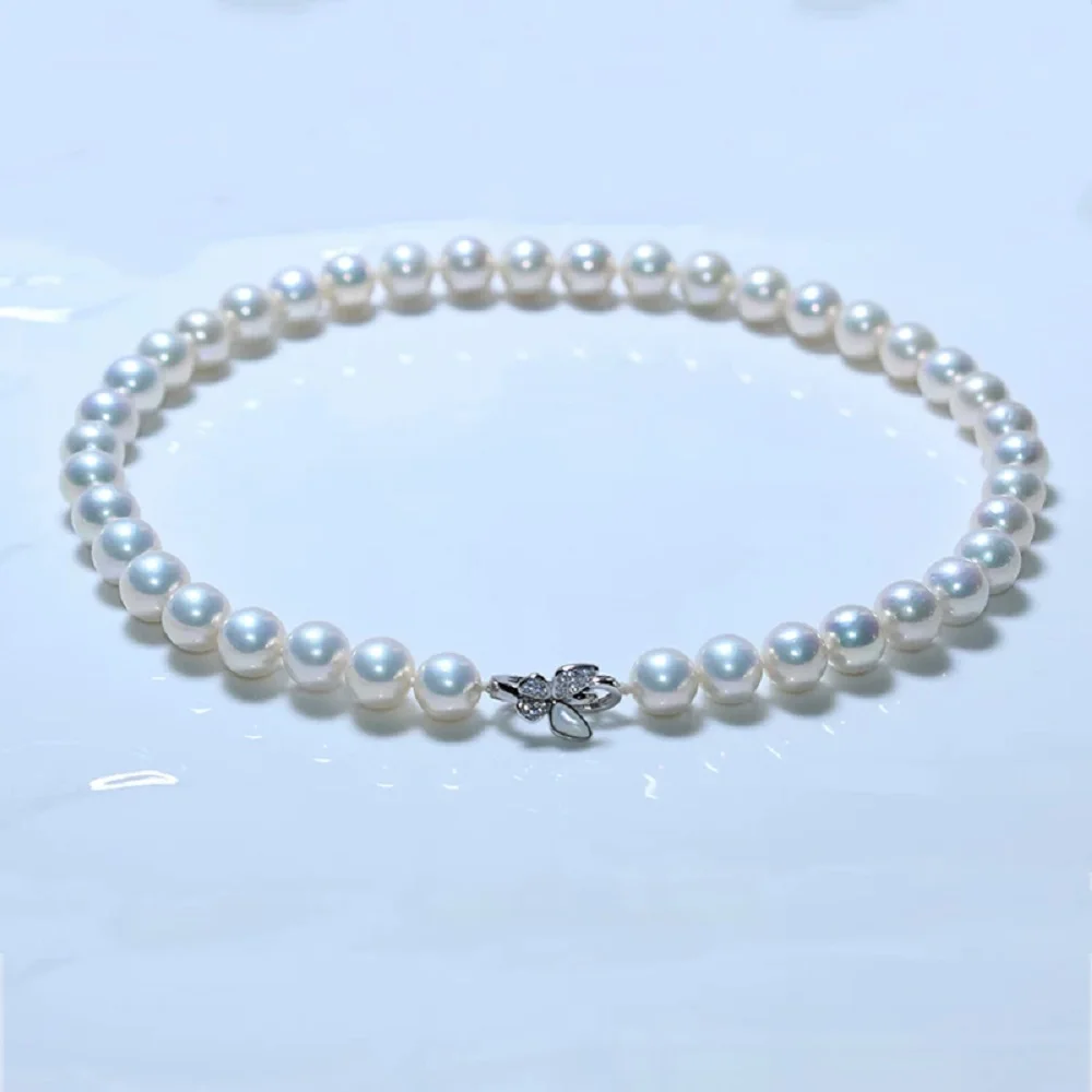 

Natural Pearl AAAA10-11mm Japanese White Round Pearl Necklace 18in/925s Butterfly Button