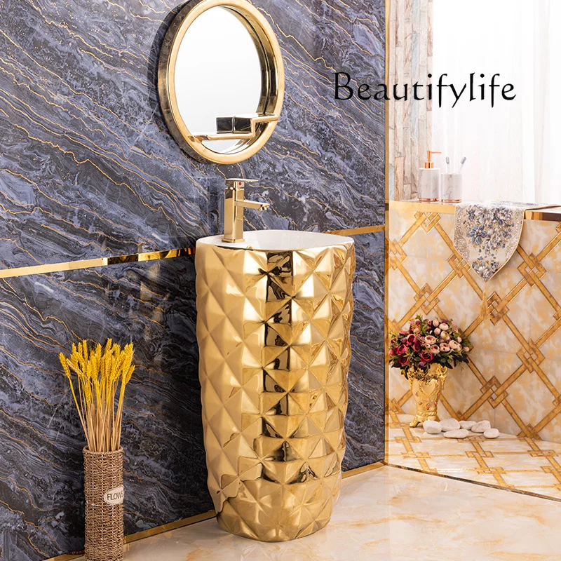 

European-style golden integrated floor-to-ceiling column basin, small apartment bathroom, wash basin, local tyrant gold wash bas