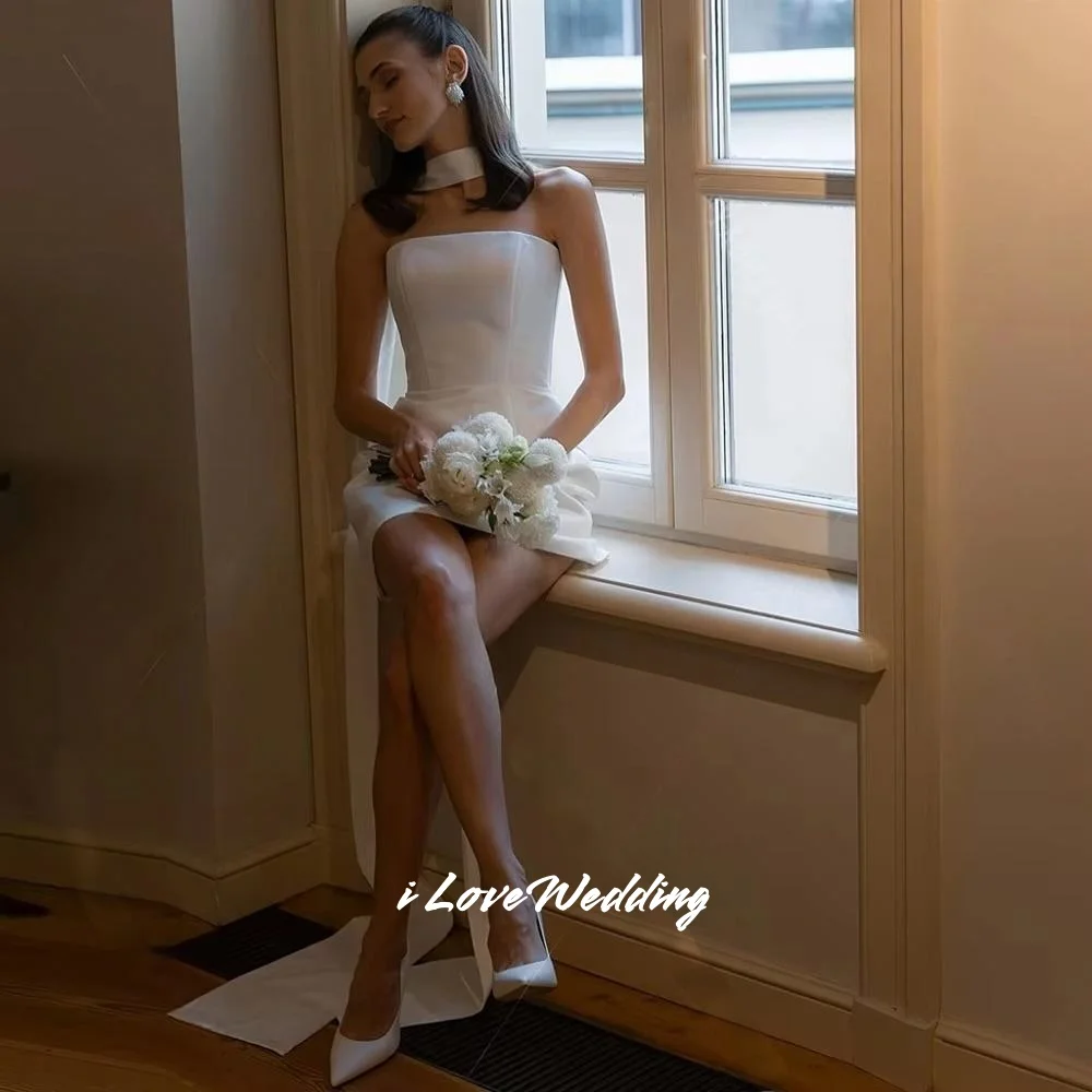 ホワイトストラップレスウェディングドレス 2025 ノースリーブ A ラインミニスカートプリーツロングスカーフフロアレングスのウェディングパーティードレスカスタマイズ