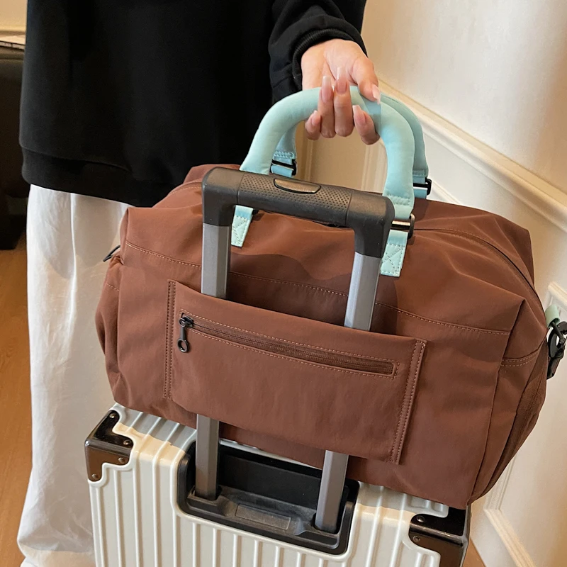 Stoffen tas met grote capaciteit Designer reiskleding Bagage Handtas Schoenencompartiment Reizen Handbediende waterdichte nieuwe crossbodytas