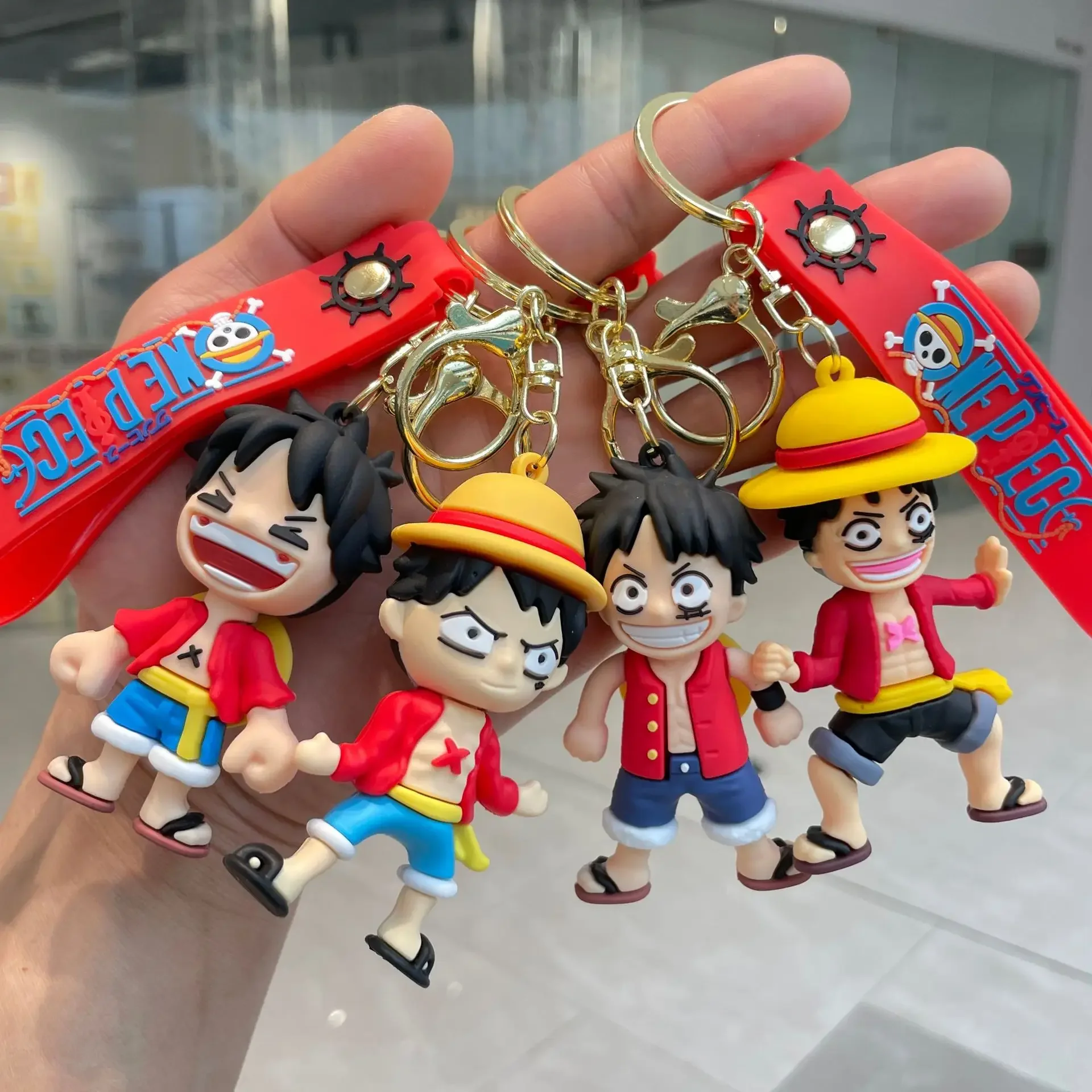 

Anime ONE PIECE Keychains Monkey D. Luffy Key Chains Cartoon Cute Doll Fashion Bag Car Pendant Figure For Unisex Gifts