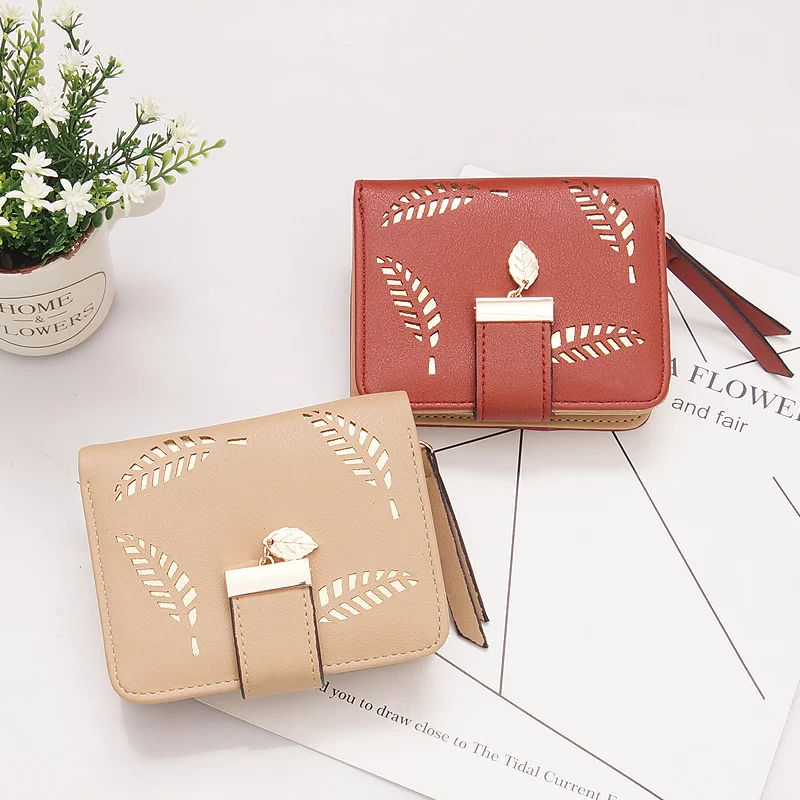 

2022 new women's short wallet Korean zipper wallet buckle hollowed out leaf small wallet zero wallet