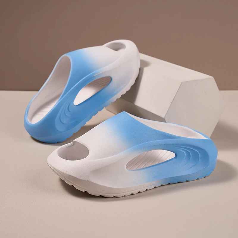 A pair of children's sandals suitable for summer wear, with thick, soft and durable sole, and gradient colors. QT-307