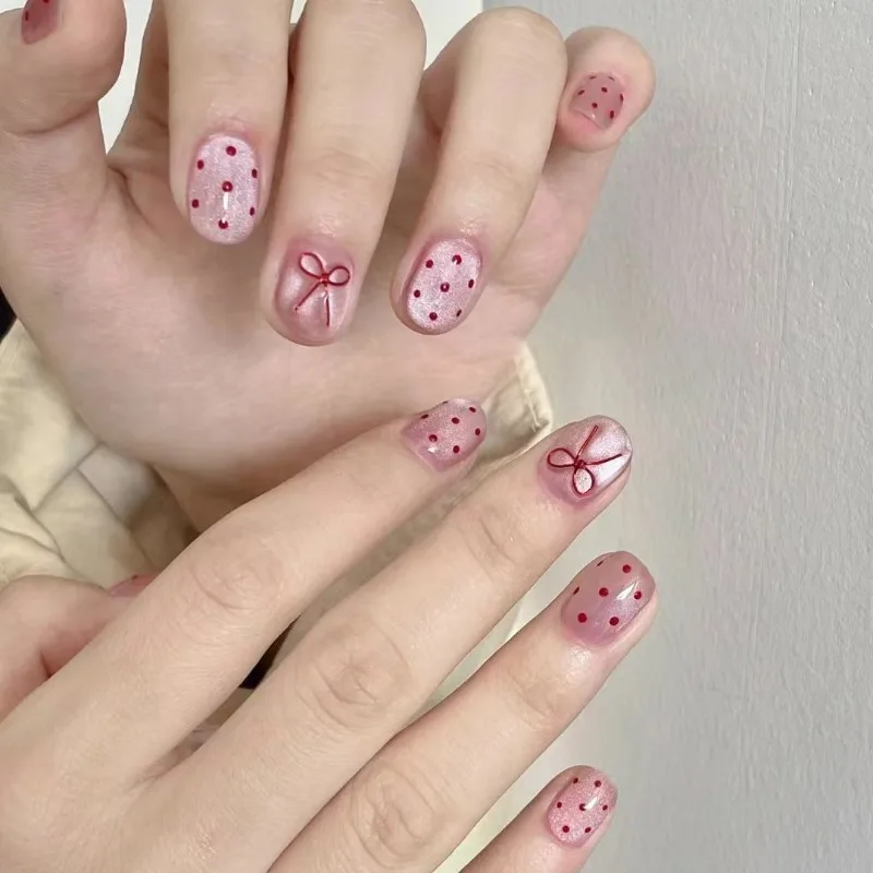 

10Pcs Strawberry Color Short Handmade Press-On Nails Cat-Eye Effect with Polka Dots&Bow Designs Nail Tips for Women&Girls Look
