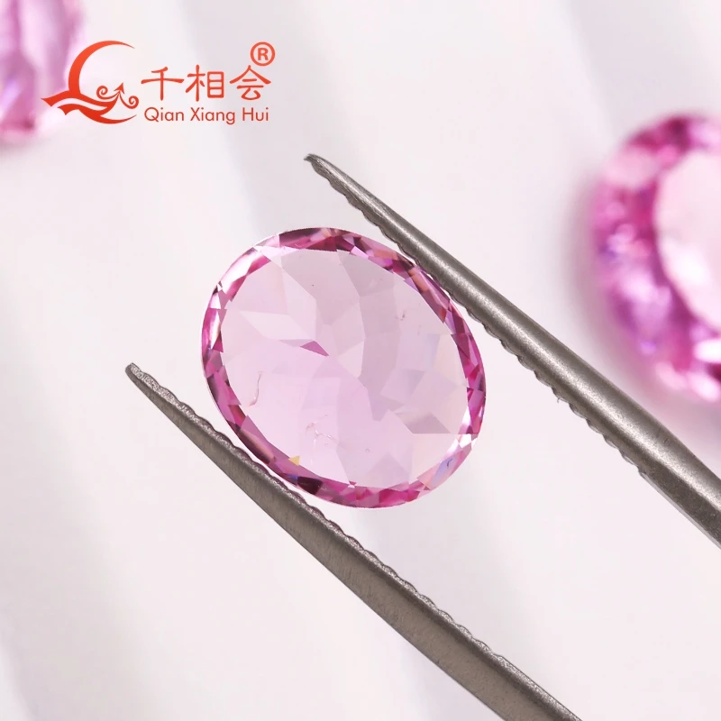 

oval shape lab created grown ruby Cherry Blossom Pink color natural cut including minor cracks inclusions loose gemstone