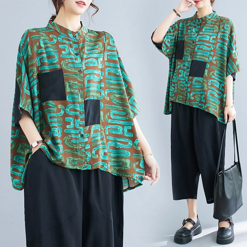 

Элегантный женский костюм-двойка больших размеров: топ и брюки с широкими штанинами, с цветочным принтом, для офиса и повседневной носки, в художественном стиле. Новинка весна-лето.