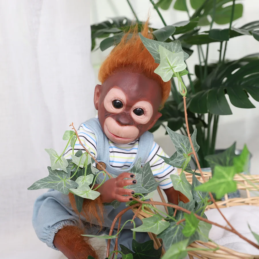 50 cm große 20-Zoll-Reborn-Puppe. Der Kopf und die Gliedmaßen bestehen aus Vinyl. Die Gliedmaßen der Puppe können sich bewegen, sie kann sitzen oder liegen. Schöne Reborn-Puppe für Kinder ab 3 Jahren