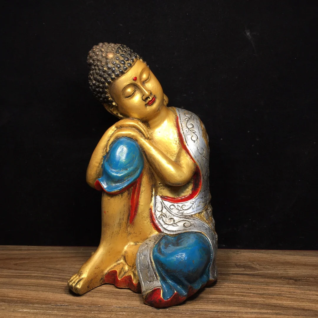 pure copper painted Buddha statue is 16 centimeters long, 14 centimeters wide, 23.5 centimeters high, and weighs 3400 grams