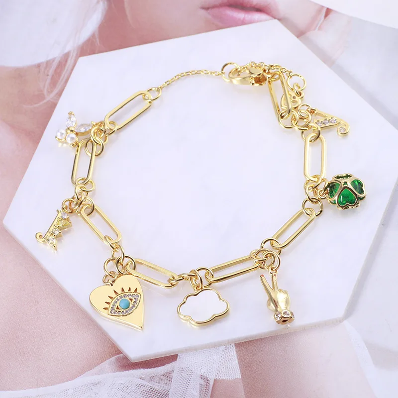 

European and American jewelry wholesale love shell cloud small hand clover pearl butterfly letter multi pendant bracelet women