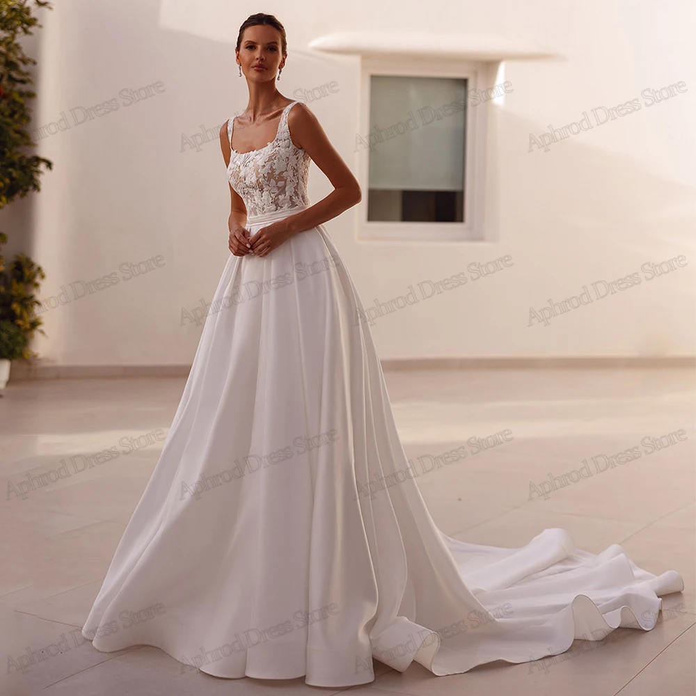 우아한 웨딩 드레스 새틴 신부 가운 레이스 아플리케 민소매 백리스 가운 라인 우아한 매력적인 Vestidos De Novia