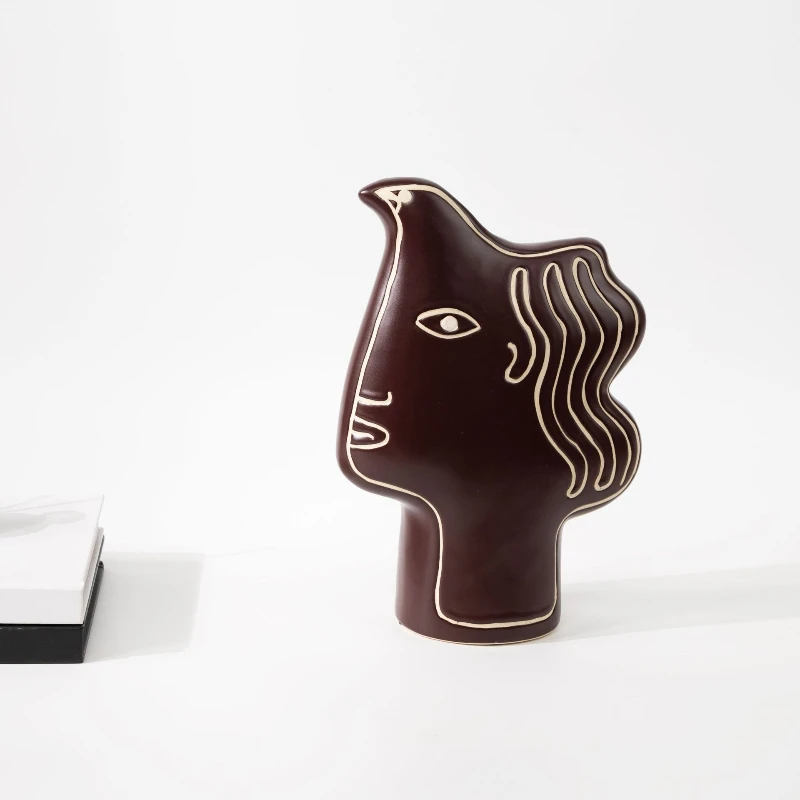 

Modern minimalist abstract bird-shaped face ceramic ornament