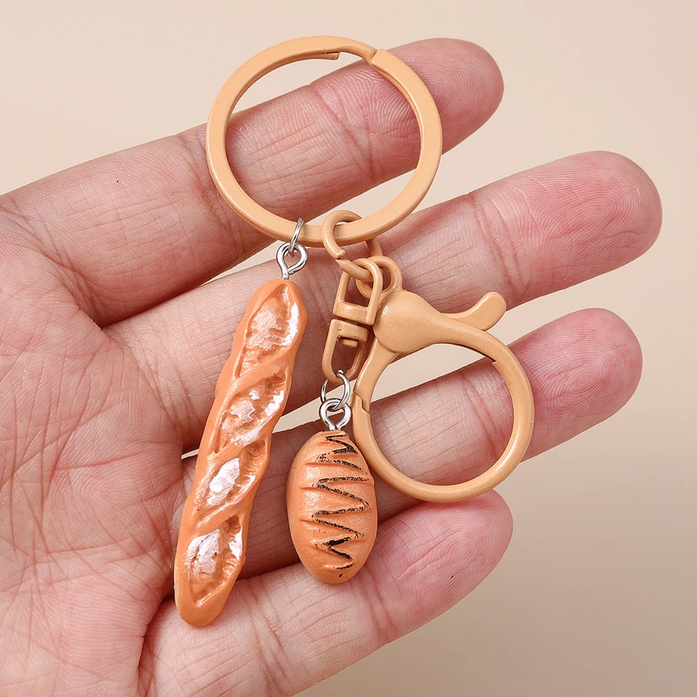 Niedlicher Schlüsselanhänger in Form eines Brotbrotes, Croissant- oder Butterbrot-Designs, für Damen und Herren, als Anhänger für Handtaschen, zum Selbergestalten von Schmuck und zur Dekoration. – Detail 11