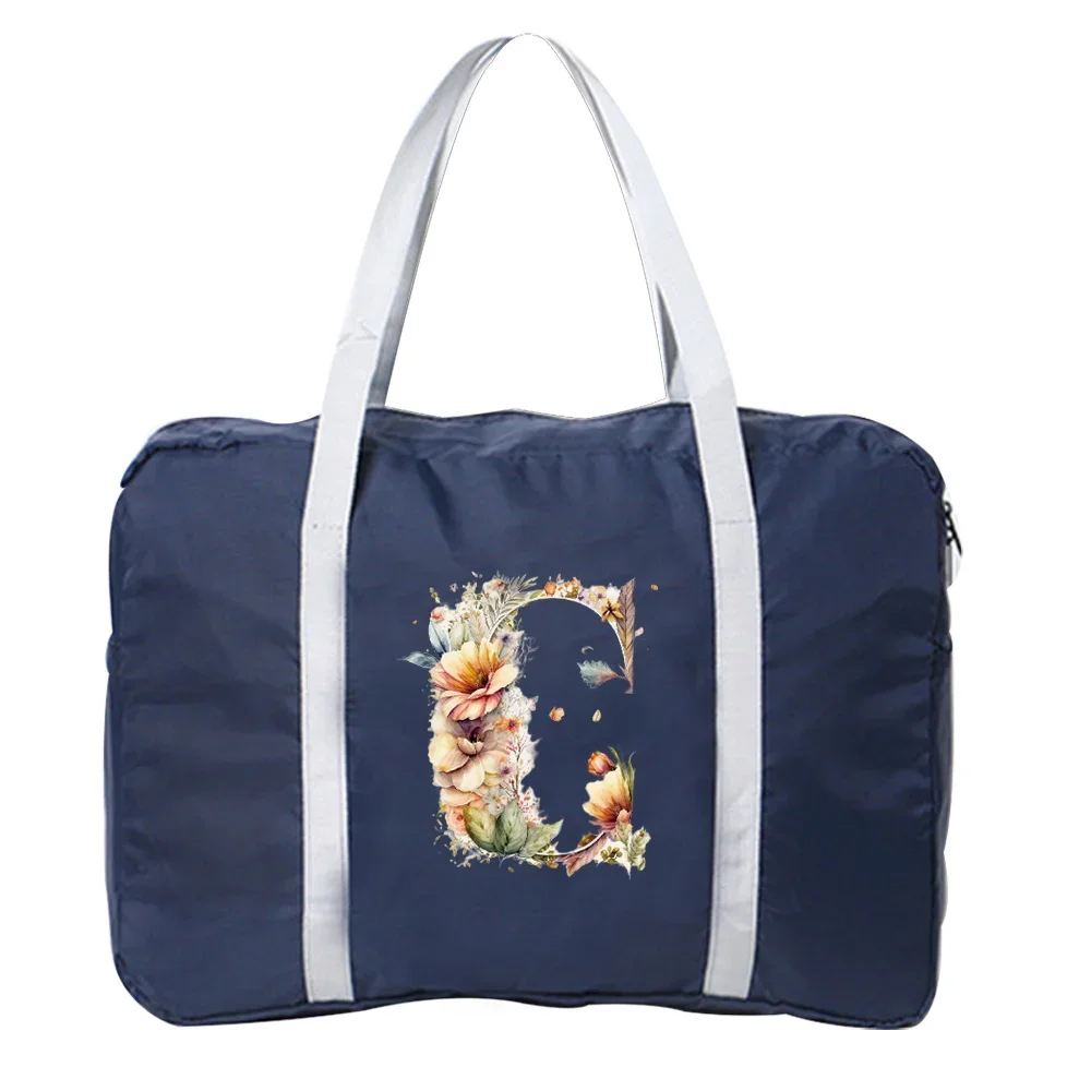 Рисунок 5 - Дорожная сумочка с цветочным буквенным принтом