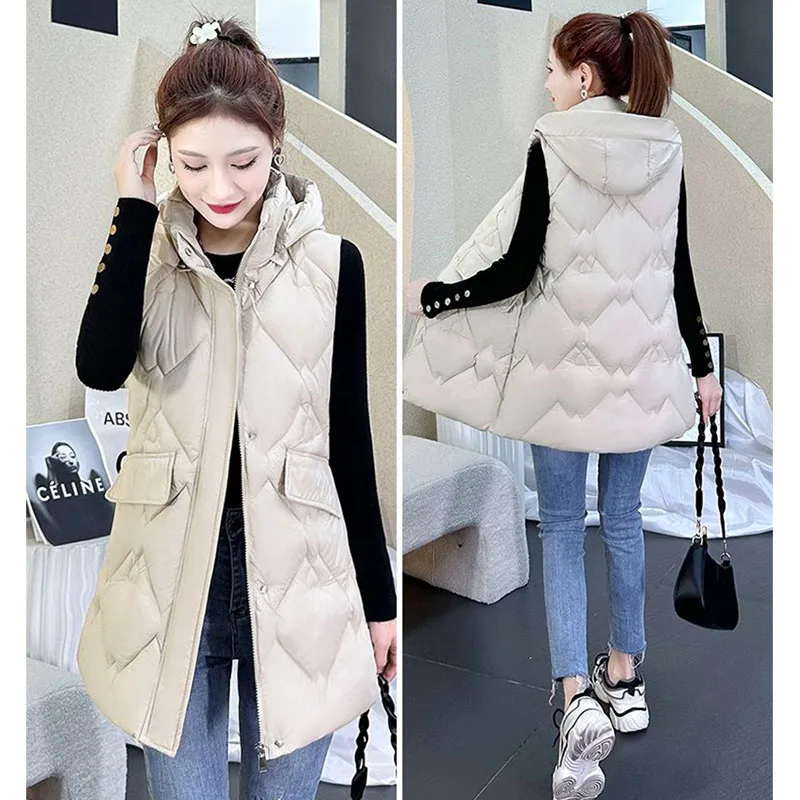سترة نسائية كورية جديدة لخريف وشتاء 2025 سترات طويلة بقلنسوة من القطن صدرية دافئة معطف بدون أكمام سترات نسائية