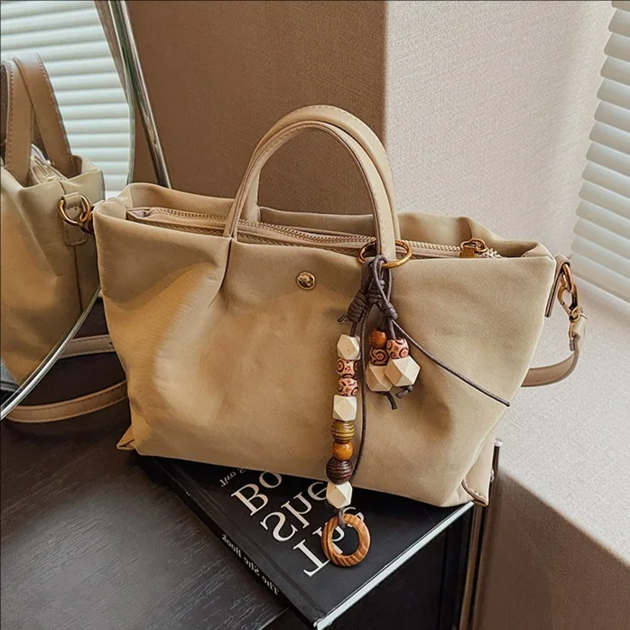 

Водостойкая нейлоновая женская большая сумка 2025 года, просторная сумка через плечо с верхней ручкой, повседневная многофункциональная сумка, прочная вместимость ​