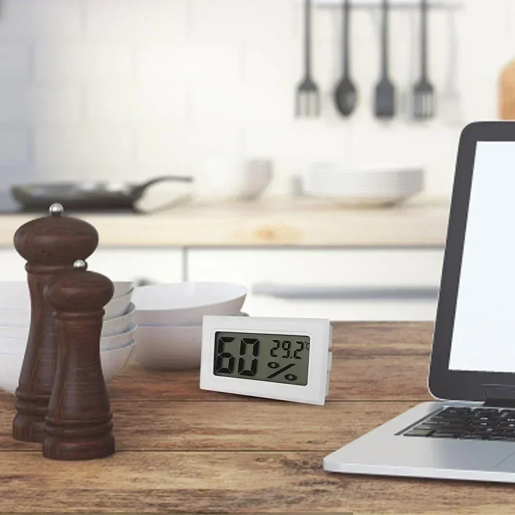 Digital temperature and humidity monitoring device with accurate sensor and large display compact and portable for indoor use
