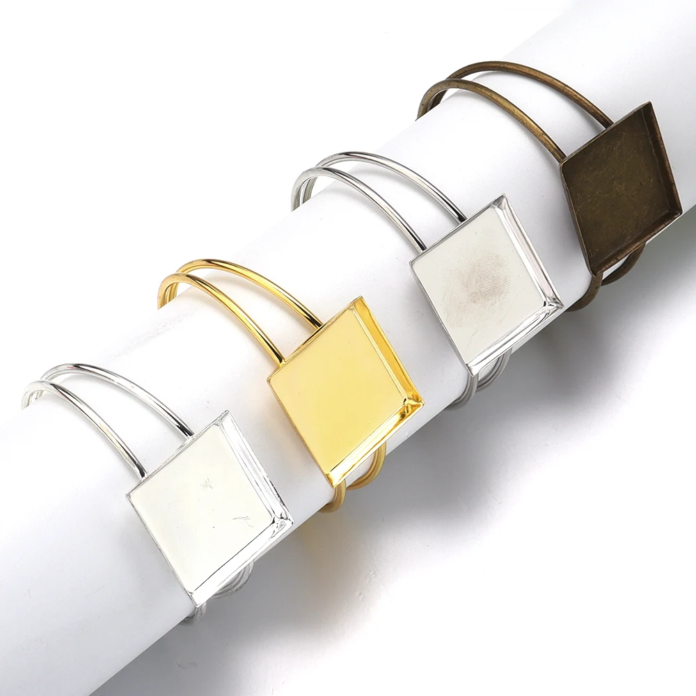 عالية الجودة الفولاذ المقاوم للصدأ 25 مللي متر 4 ألوان الإسورة قاعدة سوار النتائج فارغة صينية الحافة إعداد كابوشون النقش