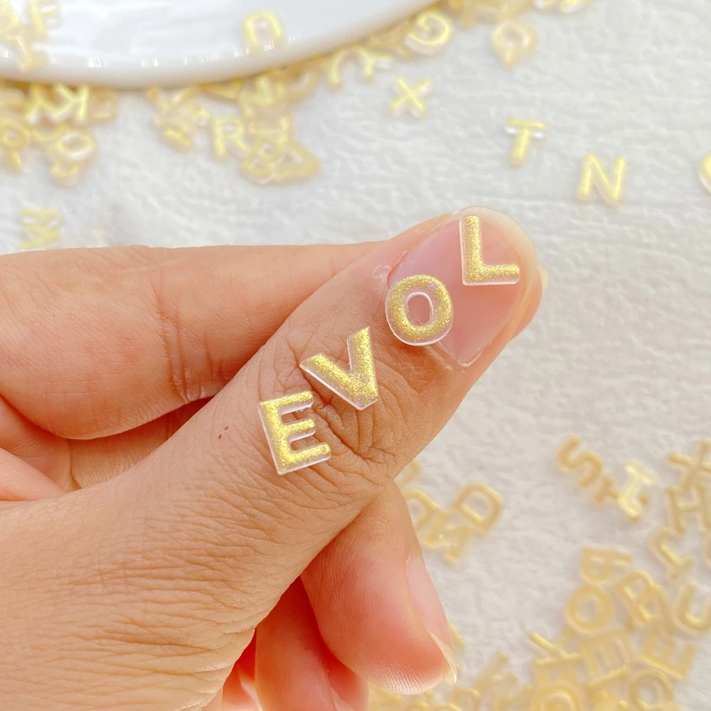 200 pçs resina mista mini dhining 26 letras douradas arte do prego parte traseira plana pedra apliques diy encantos de natal scrapbook decoração artesanato