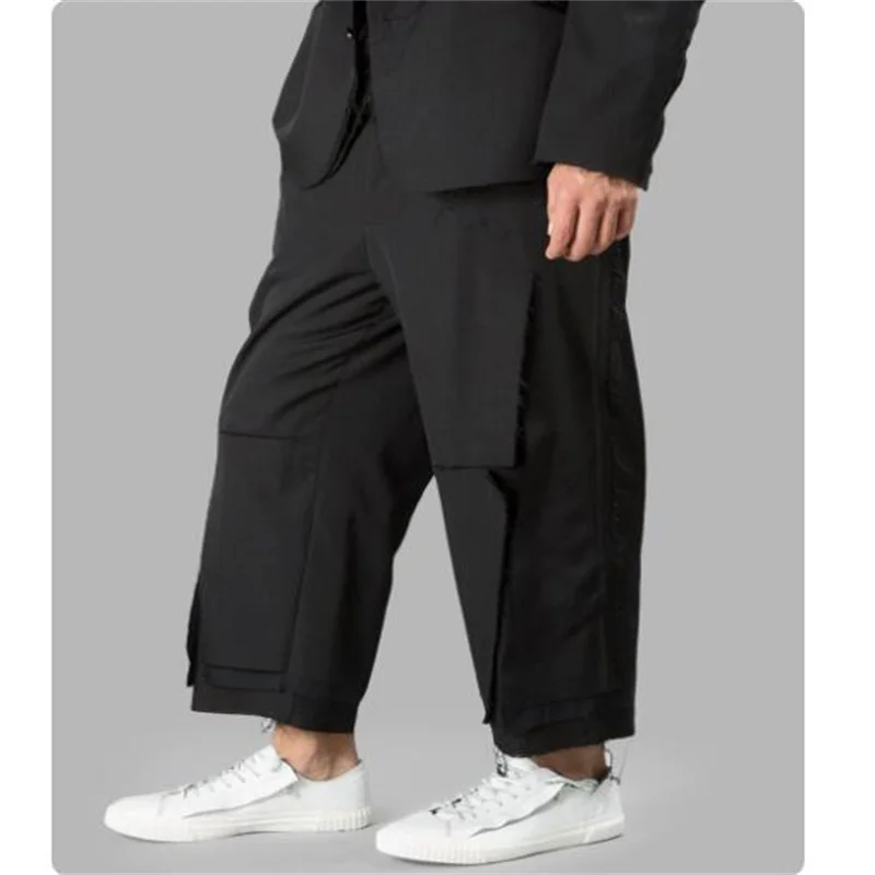Black irregular fringed nine-inch pants, anti-wrinkle multi-layer deconstructed loose dark Japanese-style long pants for men