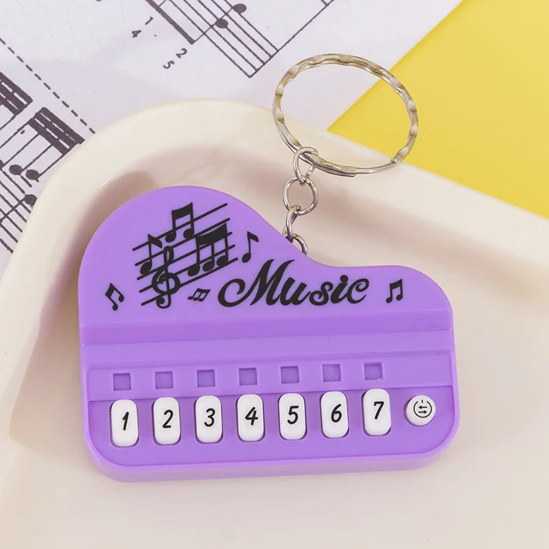 Tragbarer Mini-Schlüsselanhänger mit elektronischer Tastatur, Musikinstrumentenspielzeug – kompakter Reise-Klavier-Schlüsselanhänger für Musikliebhaber – Detail 8