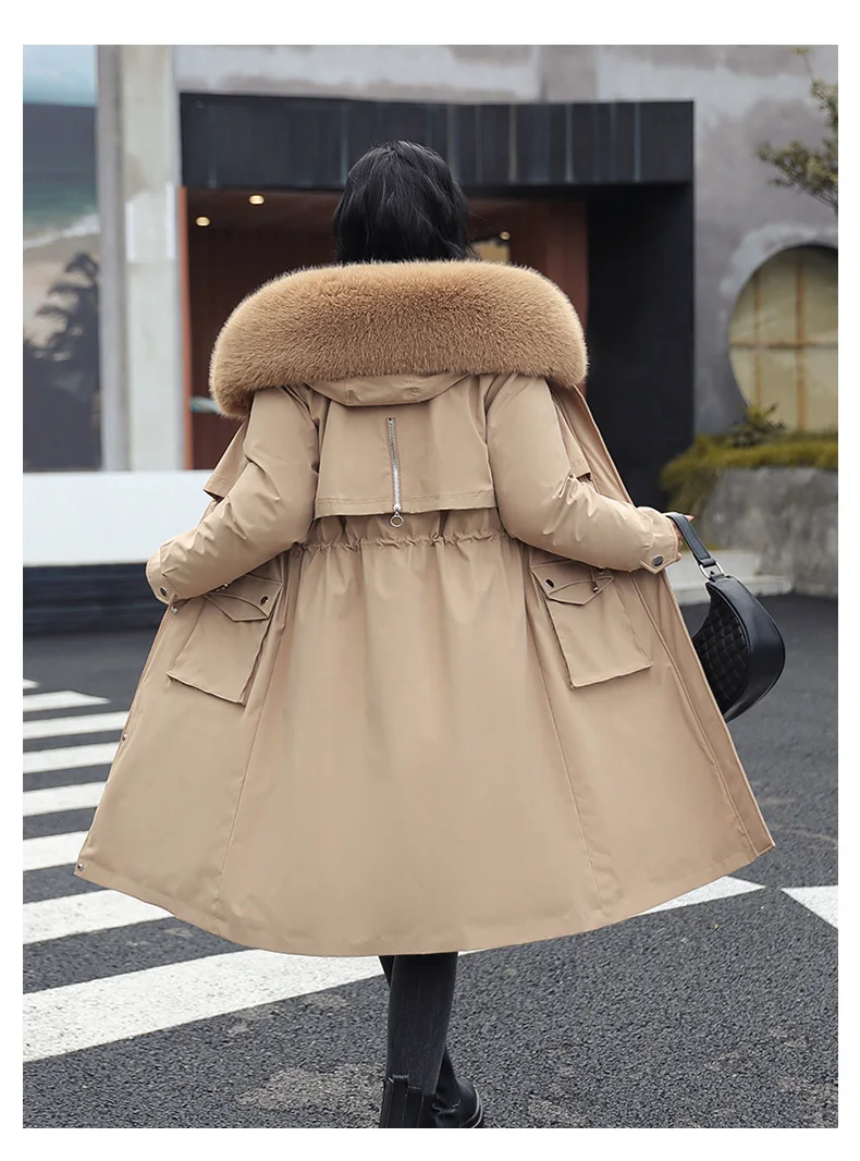 Women's Waterproof European Parka hood detail showing detachable faux fur trim and storm flap integration