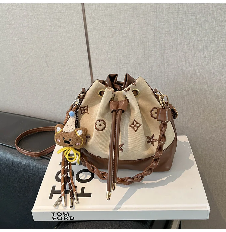 

2026 winter new bucket women handbag fashionable casual and retro bag niche design shoulder cross-body bag for women
