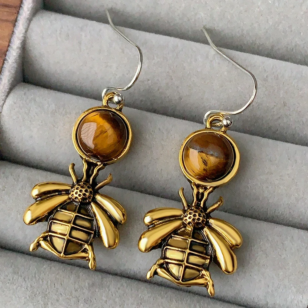 A pair of cute retro fashion little bee honey earrings for women's daily accessories decoration