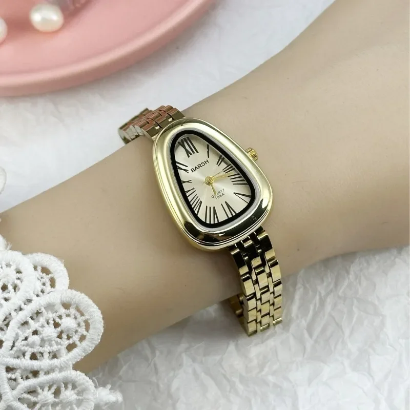 العلامة التجارية الشهيرة النساء غير النظامية الأفعى رئيس الهاتفي ساعة كوارتز فاخرة الفولاذ المقاوم للصدأ حزام ساعة اليد هدية Montre فام دروبشيبينغ