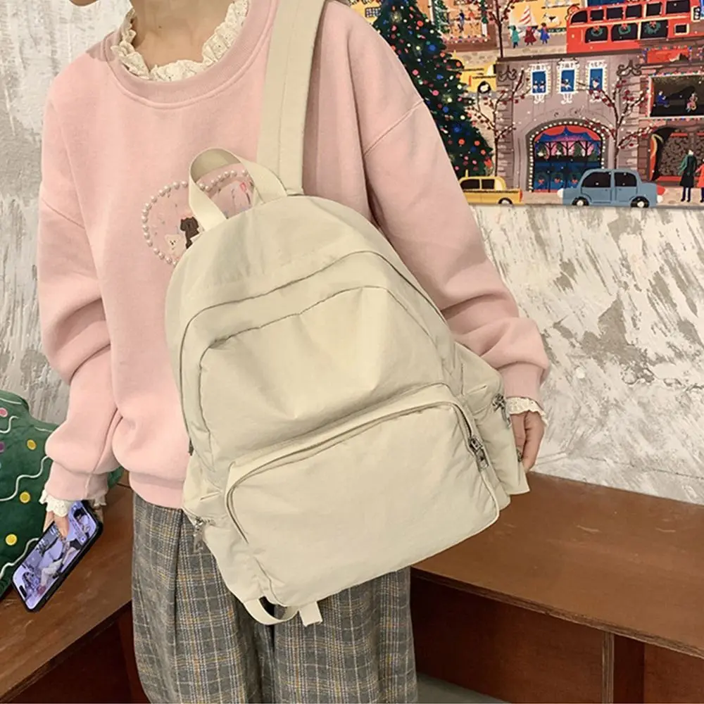 

Fashion Lightweight Travel Backpack Korean Style Waterproof Solid Color Backpack Large Capacity Nylon Student Schoolbag Outdoor