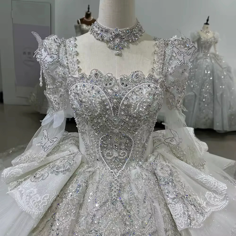 

Wedding Dress For Bride 2026 Long Sleeve Square Collar Lace Up Back Ball Gown Sequins Beading Crystal Bridal Dress