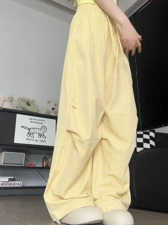 กางเกงลำลองลายทางสีเหลืองปักลายสำหรับผู้หญิง ฤดูหนาว ทรงหลวม ขากว้าง เหมาะสำหรับเต้นแจ๊ส เอวสูง ยางยืด