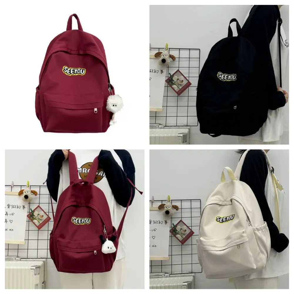 

Casual Korean Style Canvas Backpack Solid Color Large Capacity Travel Shoulder Bag Embroidered Schoolbag for College Student