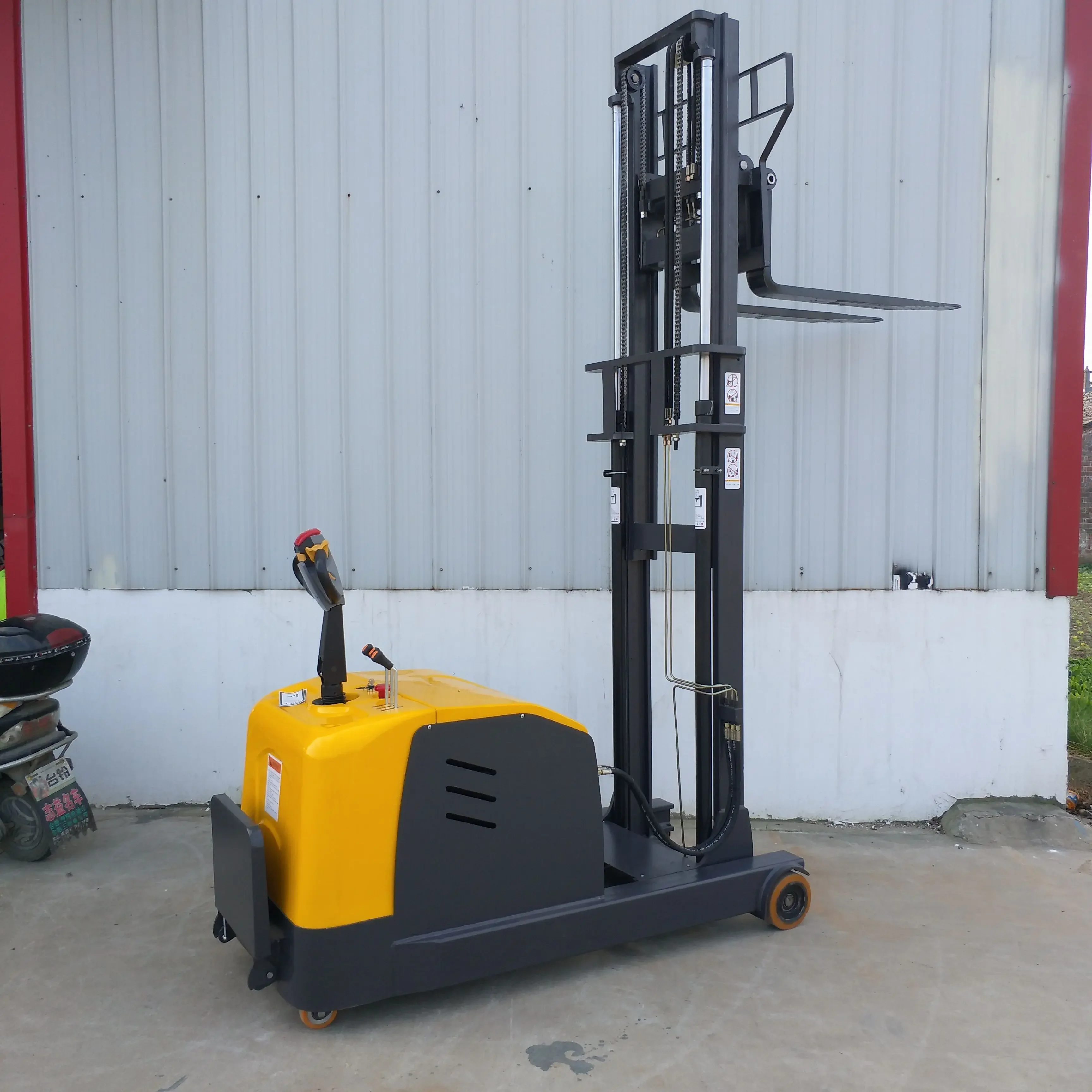 High Reach Counterbalance Forklift Stacker All Terrain Container Stacker Stand Up Reach Truck Price Electric Reach Truck