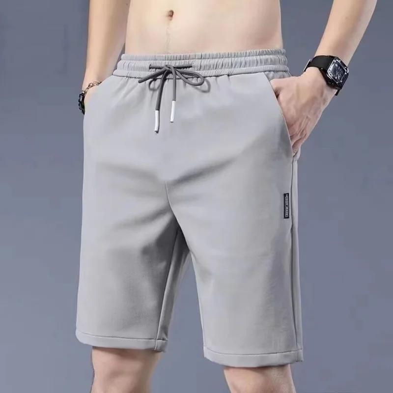 شورت بوليستر من الحرير الجليدي للرجال ، بنطلون شاطئ مرن ومربط ، متوسط وفضفاض ، 5 دقائق ، نسخة كورية ، جودة عالية ، جديد ،