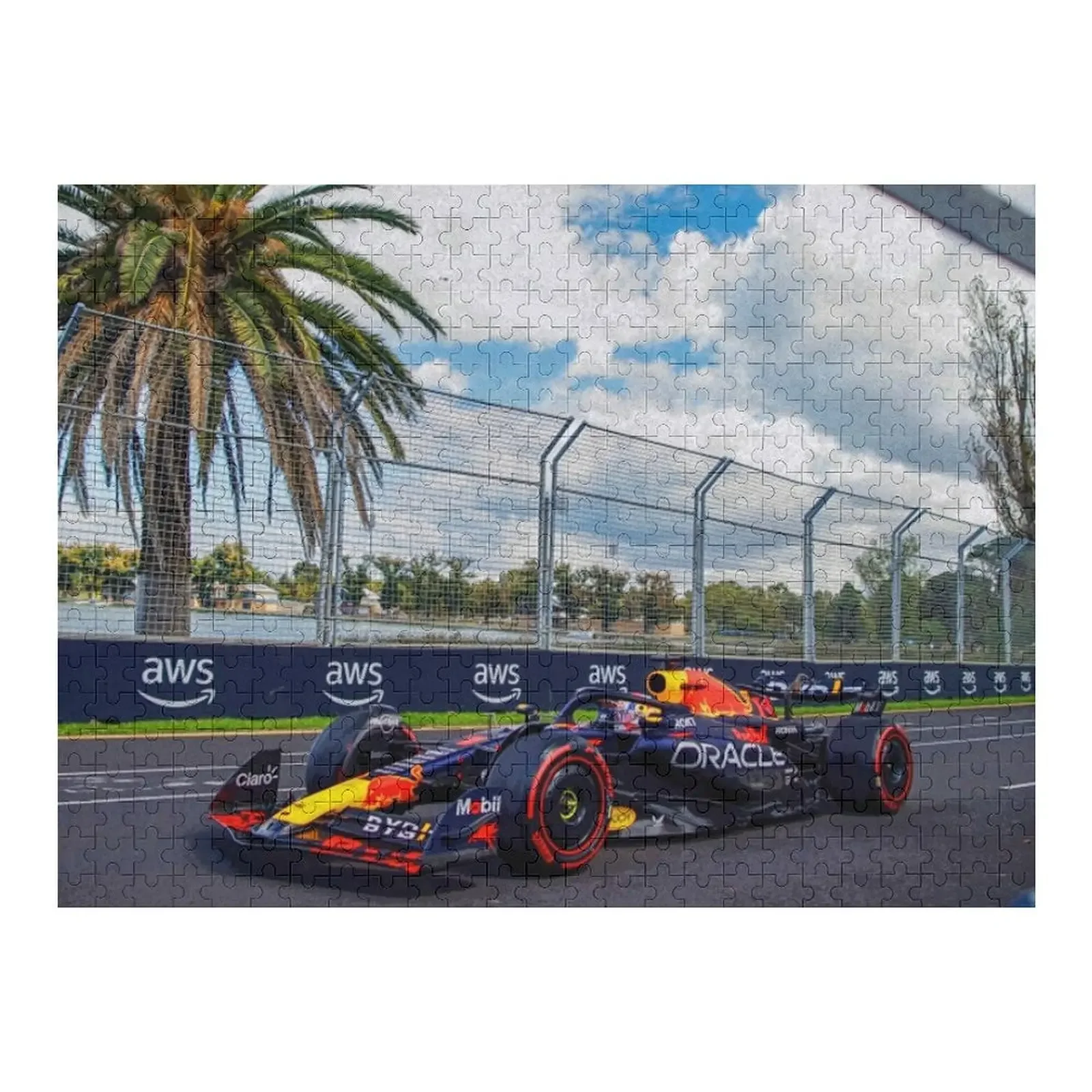 The 2022 F1 World Drivers Champion racing under the palm trees in Miami in his 2023 F1 racecar Jigsaw Puzzle Custom Puzzle