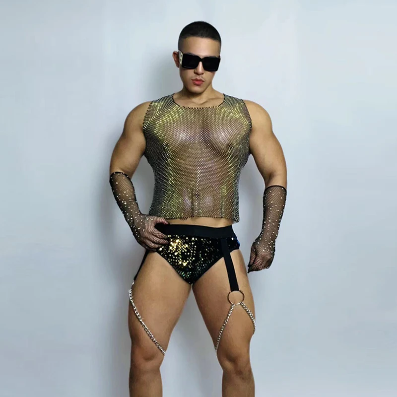 

Сексуальный мужской костюм для танцев на пилоне, для диджеев, ночных клубов, вечеринок, рейвов, с золотыми стразами, сетчатым жилетом и пайетками на шортах, сценический наряд для выступлений