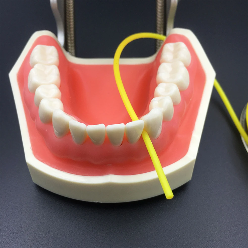 Rollo de cordón estabilizador de presa de goma Dental elástica, abrazaderas de cuñas medianas, hojas de línea, suministros de dientes para dentistas, diámetro de 2,1 m 1,8mm