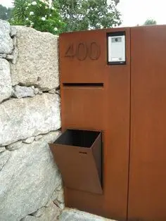 Red metal mailbox, modern mailbox, corten steel letter box with hanging wall planter